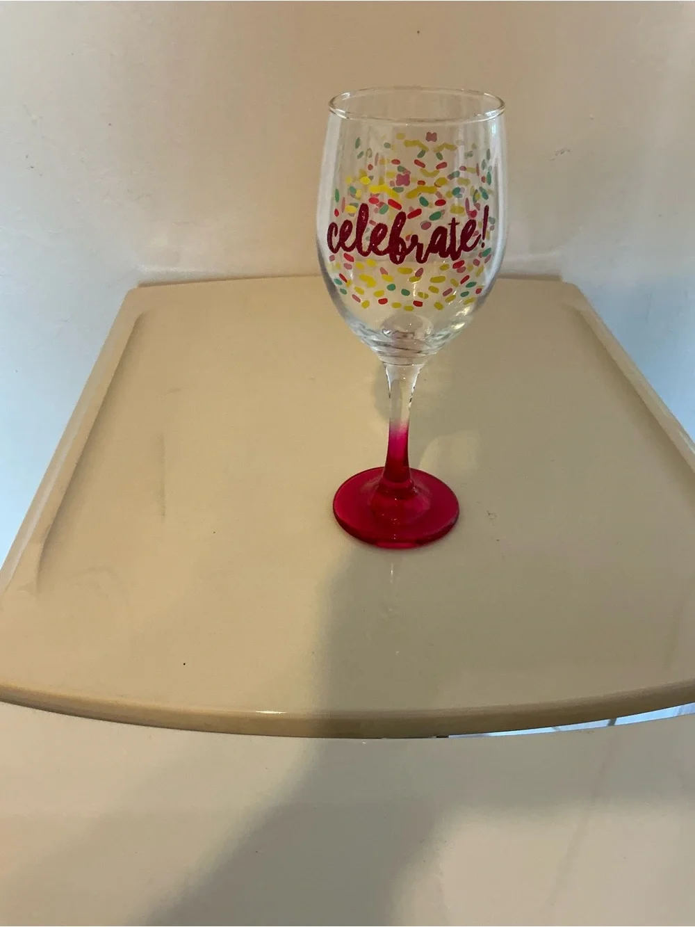 Hand Painted Celebrate Pink Stemmed Wine Glass with colorful Confetti Design